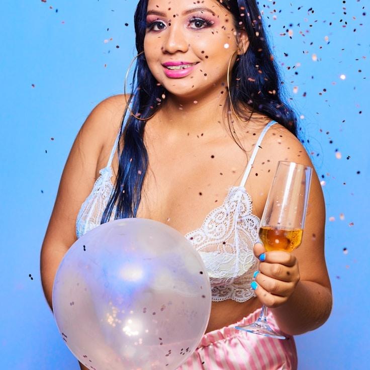 Alex Rivera, Lead Design Curator at Modest Window Layer, reviewing corporate floral arrangements